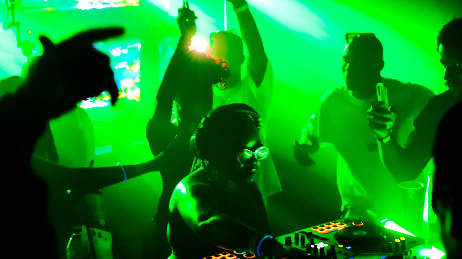 Hands up in green light